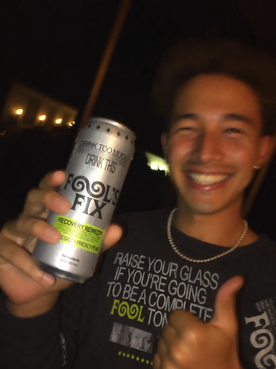Craig laughing and holding up a can of Fool's Fix